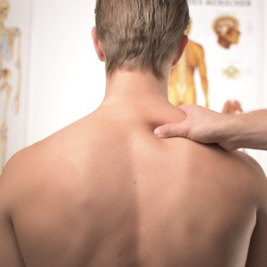 picture of man with shoulders being massaged