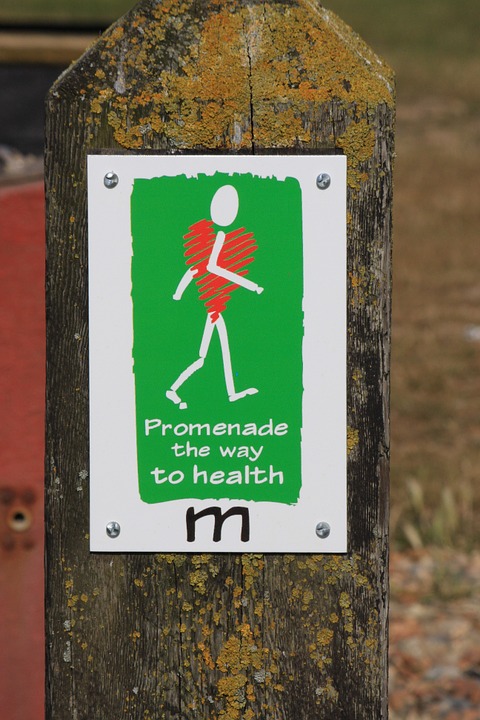 picture of a sign where a stick figure is walking to show heart health